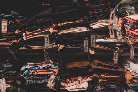 Folded clothing with the tags hanging